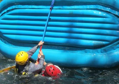whitewater rafting guide school raft flipping